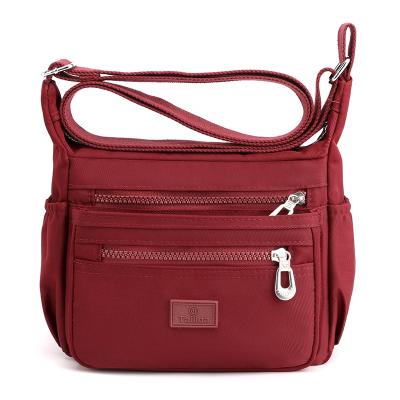 China ODM 2021Women's Vintage Messenger Shoulder Bag Travel Waterproof Nylon Cross Body Casual Zipper Water Resistant Solid Color for sale