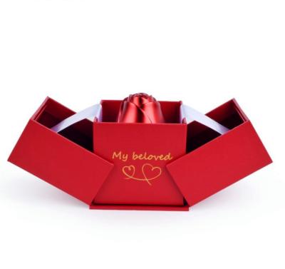 China 2021High-end design new arrival double door opening red paper Ring Box Rose Jewelry Box proposal for Valentine's Day for sale