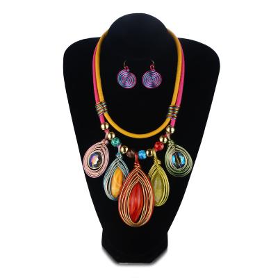 China Stylish Charming Colorful African Tribal Hand & Woven Water Drop Snake Bone Chain Multi-tiered Colorful Pendant Necklace With Matching Earrings for sale