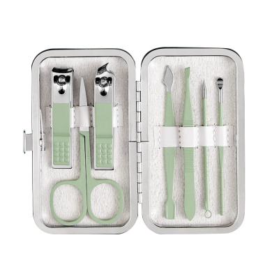 China Manicure set 7 in 1 stainless steel nail kit with tweezers and scissors, professional manicure set, grooming kit for sale