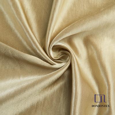 China New fashion airflow style soft smooth luminous 100% polyester anti-static imitated acetic satin for dress dress, pajamas and blouse for sale