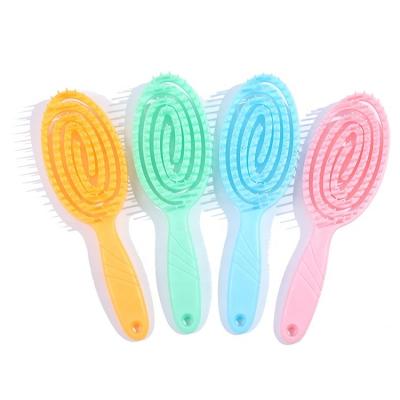 China Custom Candy Color Hair Scalp Massage Comb Hollow Cushion Duct Curved Hair Brush Detangling Hair Brush Comb for sale