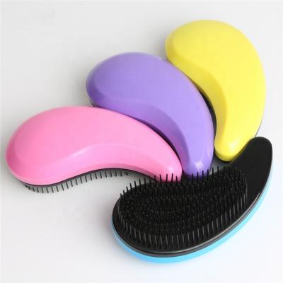 China Hot Selling Duct Comma Shape Hair Combs and Brushes Women Detangling Hairbrush for Wet and Dry Hair for sale