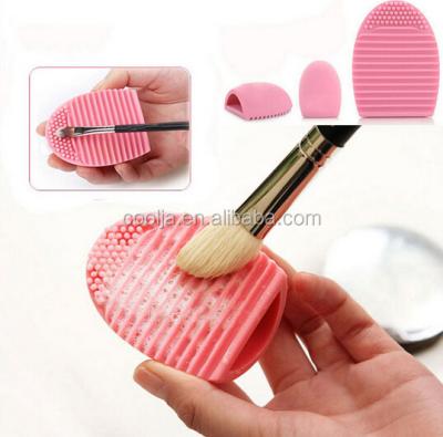 China Portable Beauty Candy Egg Brush Cleaner Silicone Makeup Brush Cleaner for sale