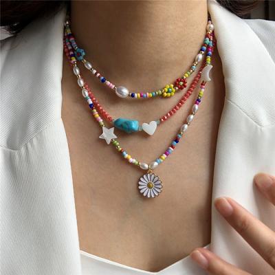 China Amazon CLASSIC Hot Selling Rice Beads Bohemian Glass Bead Daisy Flower Necklaces Seed Choker Multilayer Necklace Jewelry for sale