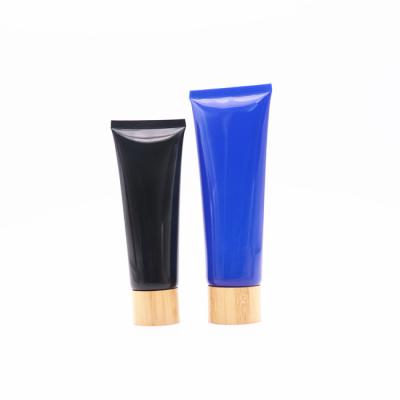 China 50g 100g Cosmetic Tubes 50g 100g Cosmetic Cream Plastic Tube Plastic Hand Squeeze Hand Tube Black Plastic Packaging for sale