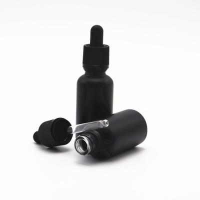 China Wholesale Cosmetic 30ml matte cbd oil tincture bottles glass black frosted dropper bottle with child safe plastic cap for sale