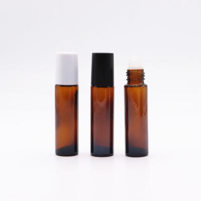 China Cosmetic Essential Oil Perfume 10ml Amber Roll On Bottle Empty Skin Care Glass Roller Bottle With Plastic Lid for sale