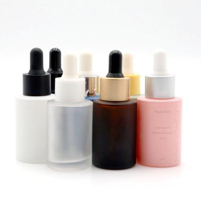 China New 30ml Luxury Cosmetic Bottles Frosted Flat Shoulder Glass Essential Oil Bottle Glass Oil Dropper Bottles for sale