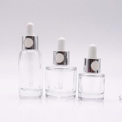 China 20ml 30ml 50ml Cosmetic Luxury Dropper Bottle Perfume Bottles Skin Care Serum Glass Bottle With Silver Cap for sale