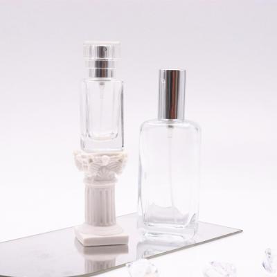 China 50ml Spray Bottle Cosmetic Luxury Glass Perfume Bottle Packaging 30ml 50ml Transparent Glass Perfume Bottles for sale