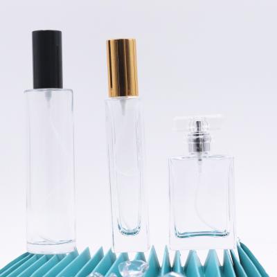 China Custom Empty Refillable Wholesale Perfume Bottle Cosmetic Perfume Bottle 50ml 100ml Spray Glass Perfume Bottle for sale