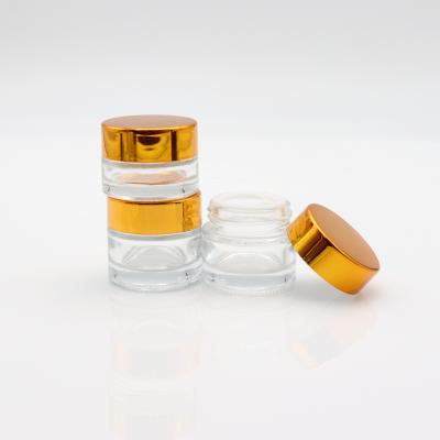 China Cosmetic Clear Candle Jar Gold Glass Lids Frosted Cosmetic Jar Sets Wholesale Empty Glass Lotion Jar for sale