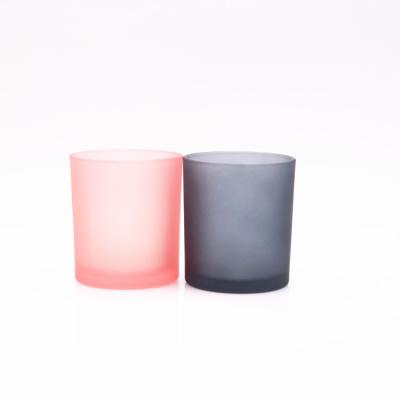 China Amber Pink Frosted Canister Shape Cylinder Decoration Packaging Glass Jar Empty Glass Candle Jar Home Wholesale Christmas for sale