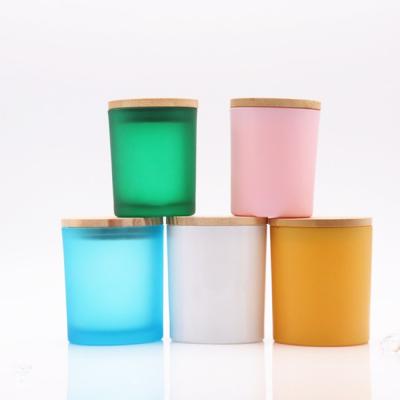 China Home Decoration Luxury Glass Candle Jar White Candle Jar Frosted Custom Unique Cylinder Candle Jars With Wood Lid for sale