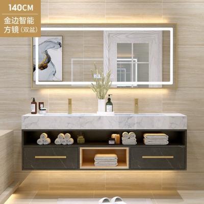 China A modern modern sink, a bathroom cabinet with a mirror, and a marble bathroom cabinet with a dressing table on the wall for sale