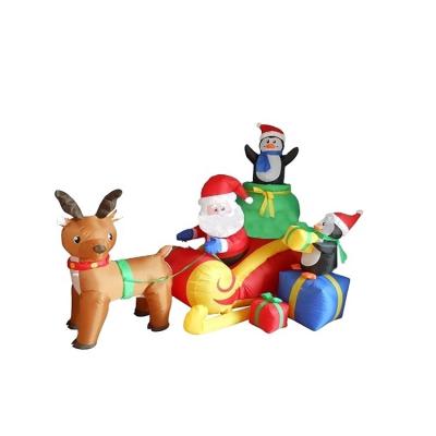 China outdoor 100%Polyester inflatable Christmas decorations with Santa Claus and penguin sculpted on a sleigh for sale