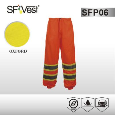 China 100% polyester cargo reflective Pants hi vis apparel with snaps closure , 10cm contrasting tape for sale