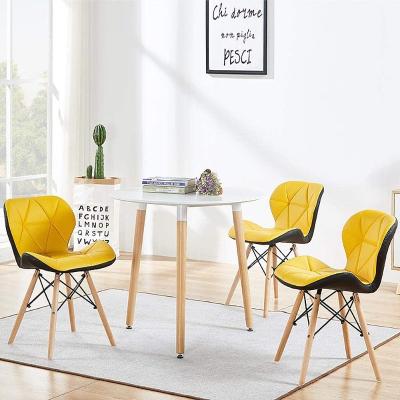 China Dining Table Sets Scandinavian Style Dining Table And 2 Chairs Kitchen Table Plastic Dining Chairs Round Table And Solid Wood Legs Chairs for sale