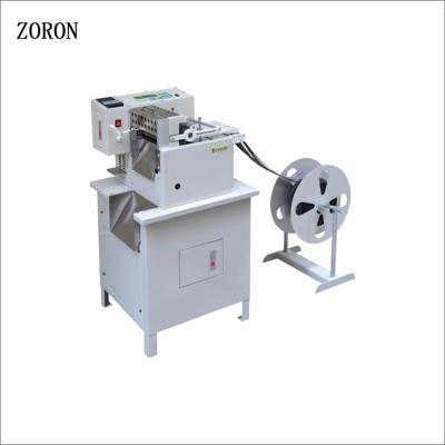 China of the length of the cut is precise computer controlled tape cutter hot&cold textiles belt automatic pvc roll fabric cutting machine for sale