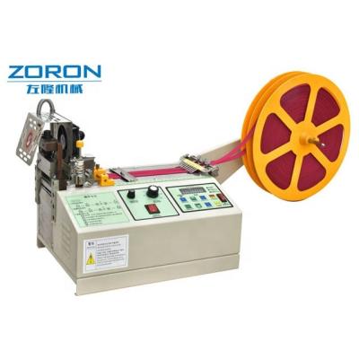 China of the length of the cut is the high quality Hot&Cold computer elastic care label tape ribbon tape waistband accurate cutting machine for sale