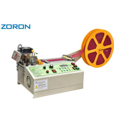 China of the length of the cut is the precise automatic hot and cold cutting machine for the elastic laces nylon zipper backpack belt tape weaving cutting machine for sale