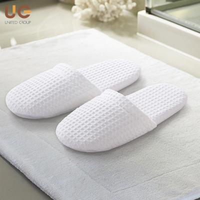 China Super Soft And Comfortable Non Slip Indoor Lounge Eva Hotel Single Slipper Made In Waffle Cotton For Guest for sale