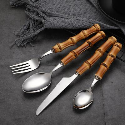 China Retro Sustainable 4 Piece Stainless Steel Handmade Set Forks And Spoons Bamboo Handle Cutlery Set for sale