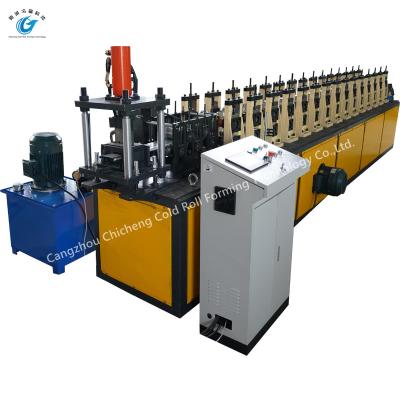 China Window Door Slat Roller Shutter Door Roll Forming Machine 6200mm*1000mm*1400mm for sale