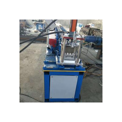 China Roofing Sheet Making Single Steel Roller Shutter Door Rolling Forming Machine for sale