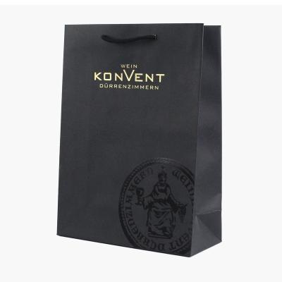 China Handmade Wholesale Custom Printed Logo Luxury Kraft Paper Bag boutique shopping gift retail paper bags with your own logo for sale