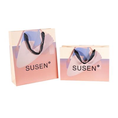 China Wholesale Handmade OEM Customized Printing Eco - Friendly Paper Tote Bags Gift Bags for sale