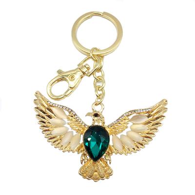 China Fashion Metal Promotional Customized Cool Bling Gold Luxury Pendant Key Chain Rhinestone Eagle Crystal Zinc Alloy Key Ring For Gift for sale