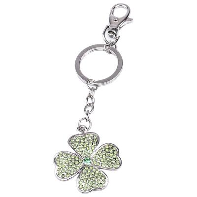 China Hot Selling Cute Personalized Lucky Cute Leaf Zinc Alloy Clover Crystal Four Rhinestone Keepsake Graduation Key Chain For Car Keys for sale