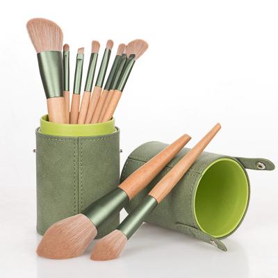 China Angular Blush Professional Low Price Makeup Set Brush 10pcs Green Wooden Handle Cosmetic Brush Cosmetics Make Up Tools for sale