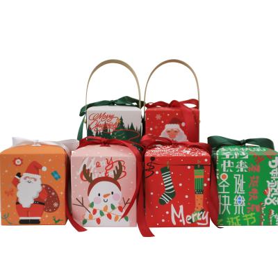 China Recyclable Paper Christmas Gift Bags With Handle Candy Treat Bags For Holiday Party Supplies for sale