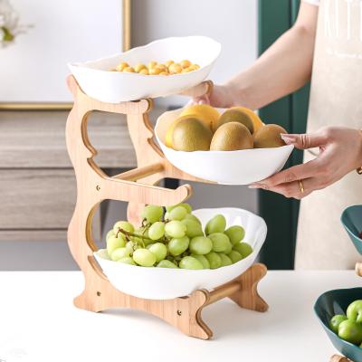 China Creative Viable European Ceramic Bamboo Wooden Household Fruit Tray 3 Tier Fruit Bowl 3 Tier Fruit Bowl Dry Nordic Boat Shape Ceramic for sale