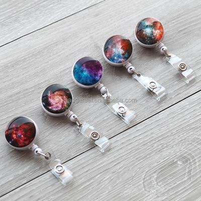 China Starry Crystal Badge Reel Stick Office Sky Retractable Holder Shell Design for Office Worker Doctor Nurse Badge Reel Pull ID Card for sale