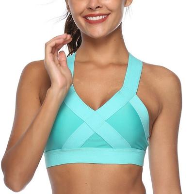 China Antibacterial Women Padded Gym Running Bra Fitness Cross Adjustment Shockproof Sports Bra Breathable Sports Top Solid Yoga Training Bra for sale