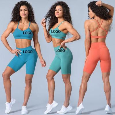 China Breathable Gym Fitness Sets Sports Solid Color Fitness Suit Gym Running Crop Top Gym Jumpsuit Bra Sports Bra Shorts Suit for sale