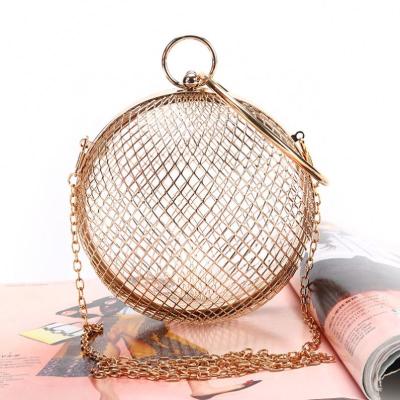 China Luxury Clutch Bags Wedding Party Cross - Body Purse Women Shoulder Bag Gold Caged Metal Ball Round Hollow Clutch Evening Clutch Bag for sale