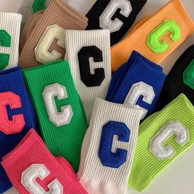 China Z-04 Breathable Custom Sports Big C Couple Socks Women Letters Designer Street Socks for sale