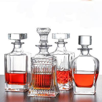 China Beverage Custom 50ml 100ml 200ml 500ml Whiskey Bourbon Juniper Bottle Fancy Wine Glass Bottle for sale