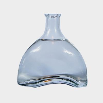 China 750ml Beverage Whiskey Yuanbao Shaped Glass Wine Shaped Bottle Vodka Bottle for sale