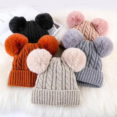 China COMMON Women's Winter Faux Fur Pom Pom Beanie Double Balls Knitted Skullies Pompom Beanies for sale