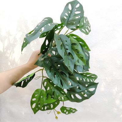 China Fashional 2021 Factory Wholesale Artificial Vine Monstera Plant Decorative Hanging Greenery for sale