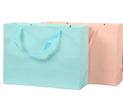 China Recyclable White/Black/Kraft Paper Bags Large DIY Gift Bag Recyclable For Clothes Wedding Birthday Party With Handles Celebration for sale