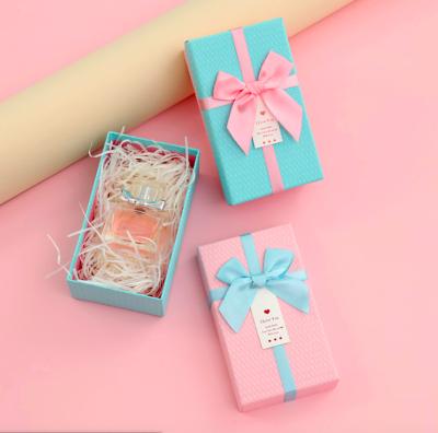 China Recycled Materials Wholesale Custom Contrast Color Perfume Box Birthday Gift Ribbon Bow Packing Box for sale