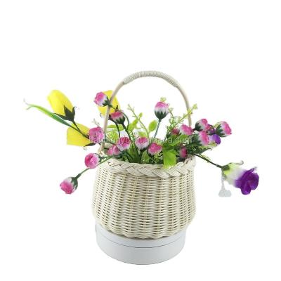 China Sustainable Rattan Vase Flower Basket Rattan Storage Baskets Fruit Bread Basket for sale