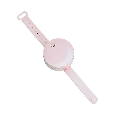 China 2021 New Hotel Fan Shaped Muiltifunctional Mini Fan Portable Wrist Launch Watch With Make Up Mirror For Girls for sale